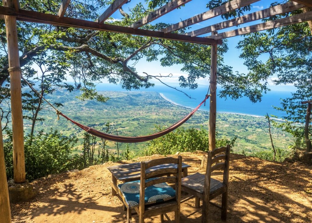 A hammock looking out over Lake Malawi, Mushroom Farm.